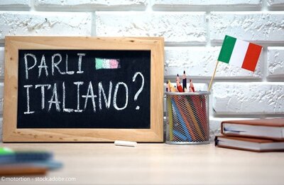 Bild vergr&ouml;&szlig;ern: Ein Schild mit einem Satz auf Italienisch