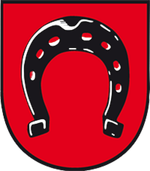 Diedesfelder Wappen mit schwarzem Hufeisen auf rotem Hintergrund